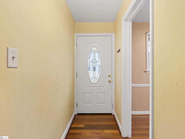 doorway to outside with dark hardwood / wood-style flooring