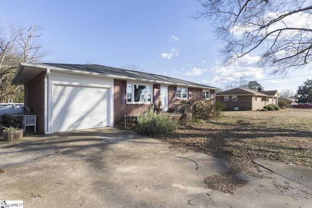 single story home featuring a garage