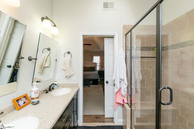 bathroom with vanity and walk in shower