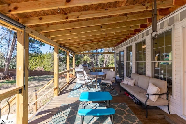 sunroom with vaulted ceiling