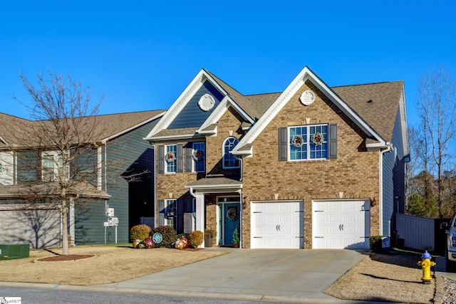 view of front of home with a garage