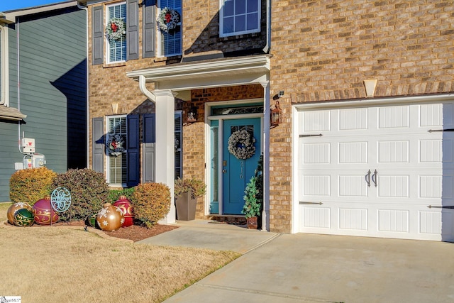 entrance to property featuring a garage