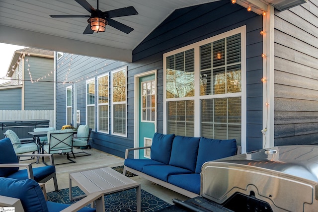 exterior space with outdoor lounge area and ceiling fan