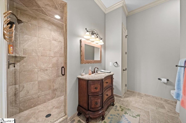 bathroom with vanity, toilet, walk in shower, and crown molding