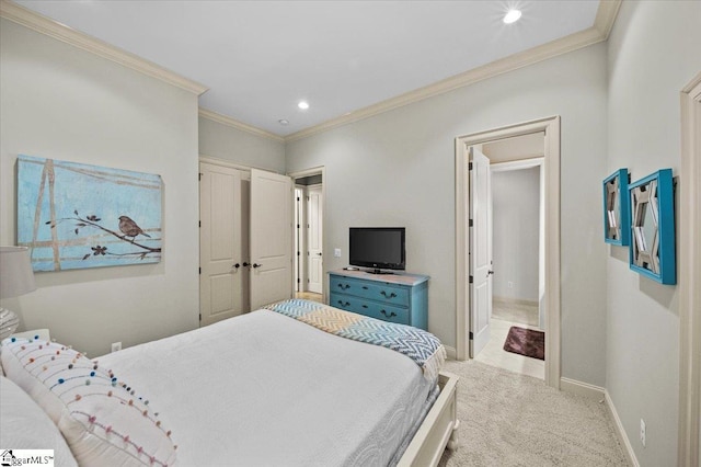 carpeted bedroom with a closet and ornamental molding