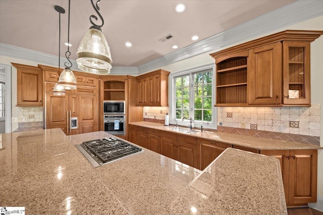 kitchen with pendant lighting, sink, light stone countertops, ornamental molding, and stainless steel appliances