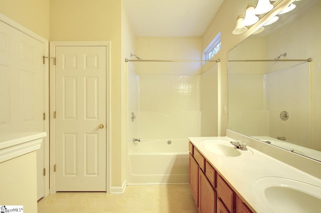 bathroom featuring vanity and washtub / shower combination