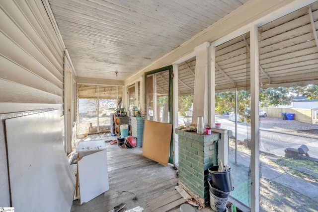 sunroom with wooden ceiling