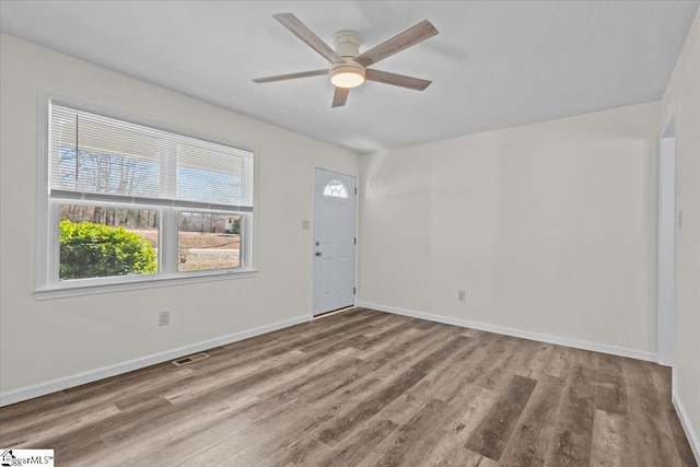 foyer with ceiling fan and hardwood / wood-style flooring