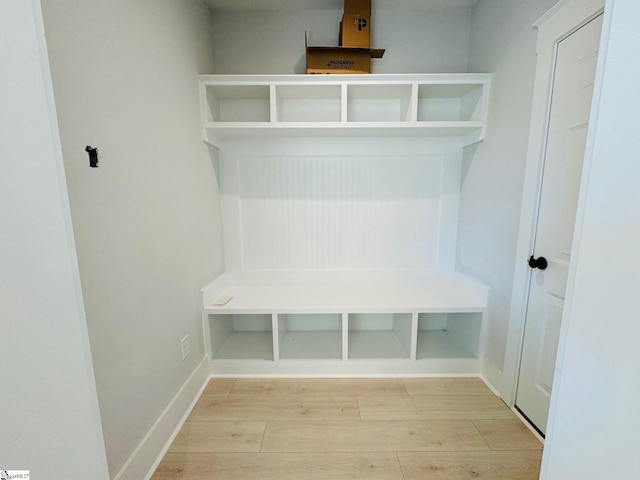 mudroom with light hardwood / wood-style flooring