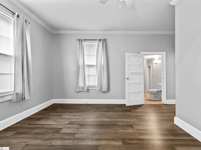13 Damson St, Spartanburg, SC 29303 - empty room featuring ceiling fan, ornamental molding, dark wood-type flooring, and a wealth of natural light
