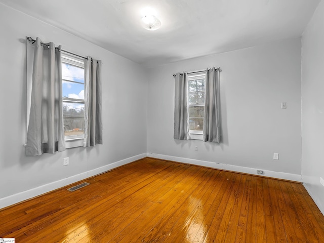 13 Damson St, Spartanburg, SC 29303 - unfurnished room with hardwood / wood-style flooring and a wealth of natural light