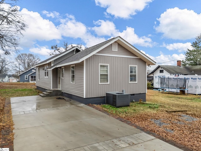 13 Damson St, Spartanburg, SC 29303 - view of side of property featuring central air condition unit and a yard