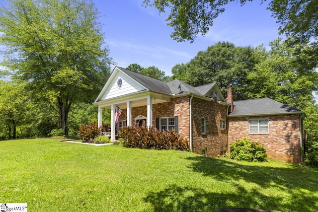 view of front of house with a front yard