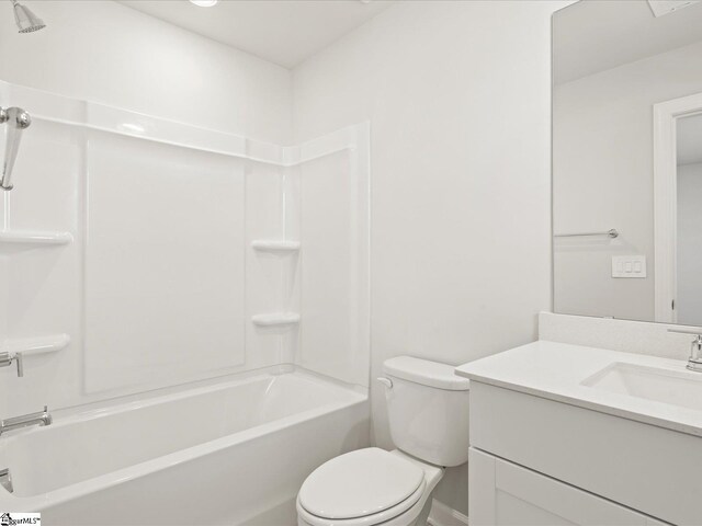 full bathroom with washtub / shower combination, vanity, and toilet