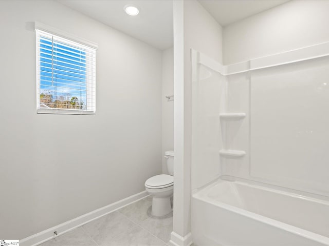 bathroom featuring shower / tub combination, tile patterned flooring, recessed lighting, toilet, and baseboards