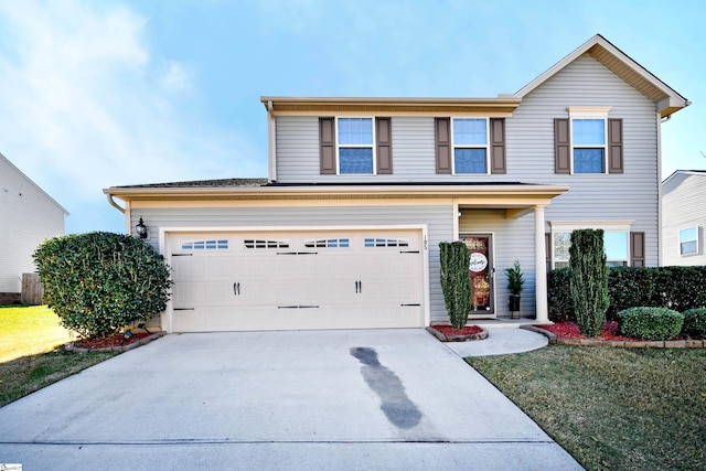 view of front of home with a garage