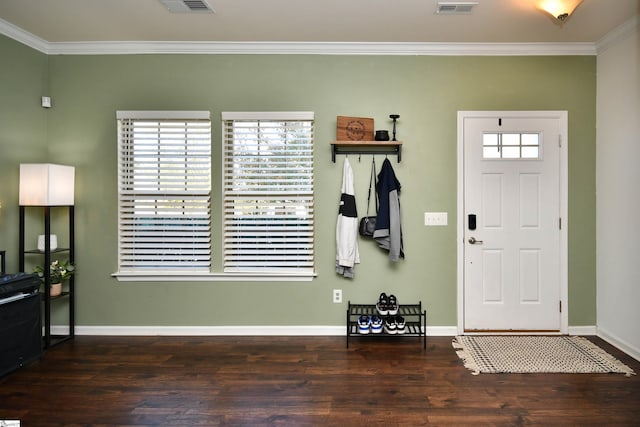 entrance foyer with dark hardwood / wood-style flooring and ornamental molding