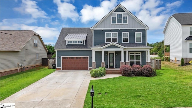 craftsman house with a front lawn, covered porch, and a garage