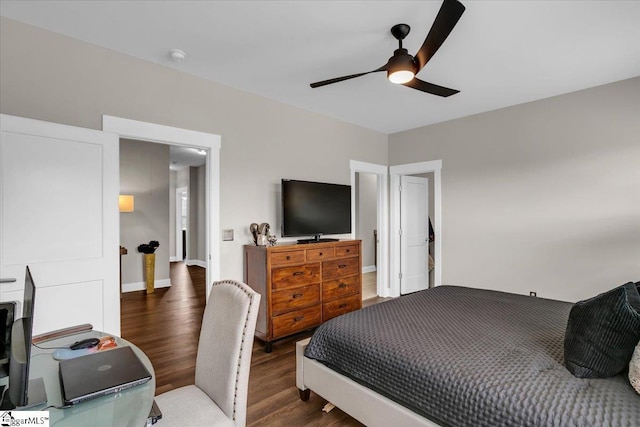 bedroom with wood-type flooring and ceiling fan