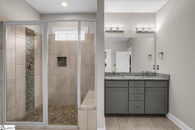 bathroom with vanity and an enclosed shower