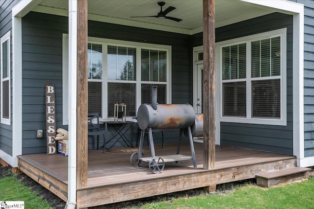 wooden deck with ceiling fan and a porch