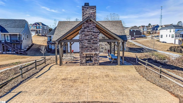 view of yard featuring a fireplace