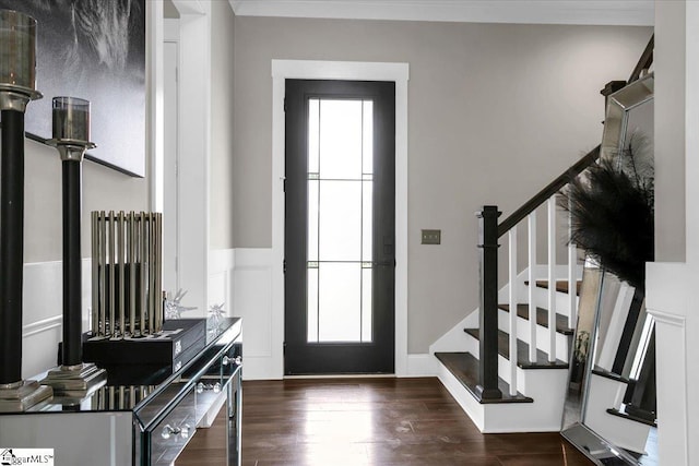 foyer with plenty of natural light and dark hardwood / wood-style flooring