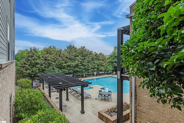 view of swimming pool featuring a patio