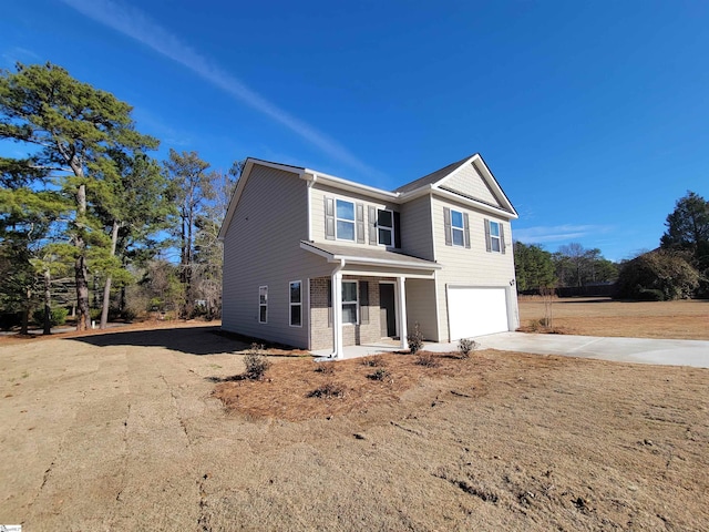 front of property featuring a garage