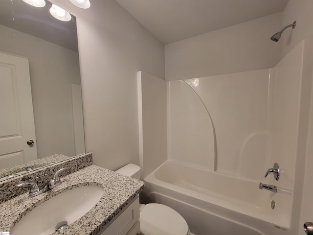 full bathroom with vanity, shower / bathtub combination, and toilet