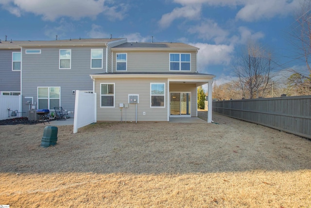 back of house featuring a patio area