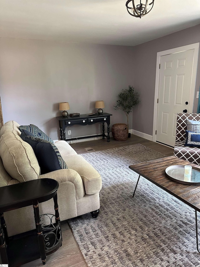 living room featuring an inviting chandelier