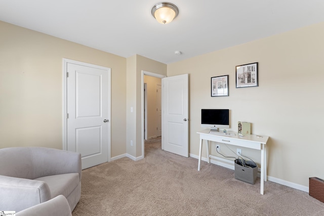 living area featuring light colored carpet