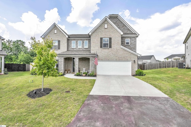 craftsman-style house featuring a front yard, a garage, and cooling unit