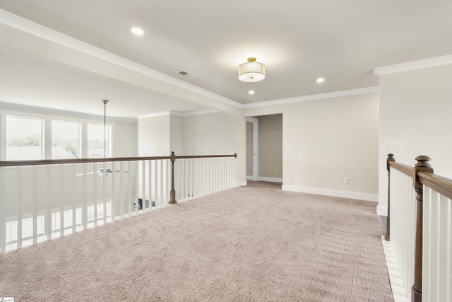 empty room with carpet flooring and ornamental molding