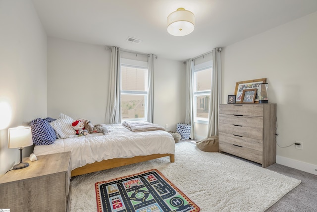 bedroom featuring carpet