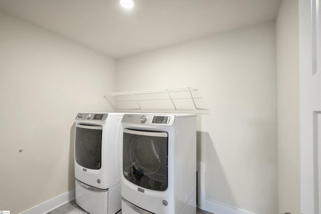 laundry area with washer and clothes dryer