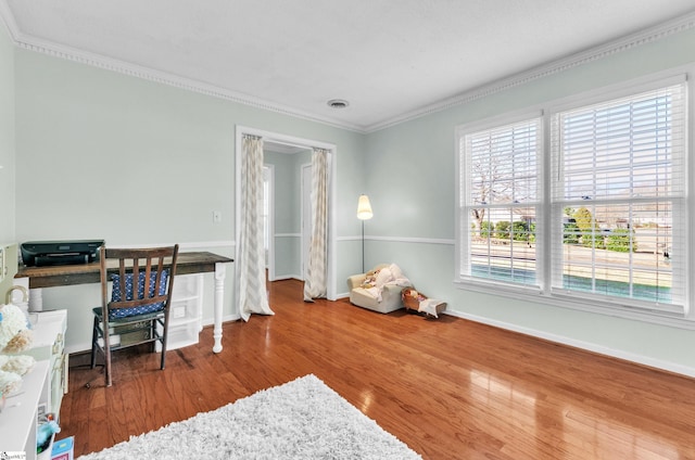 office space featuring hardwood / wood-style flooring and crown molding