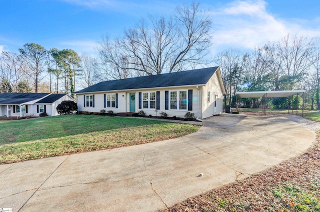 ranch-style house with a carport and a front lawn