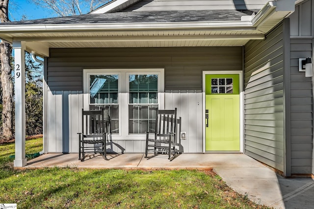 property entrance featuring a porch