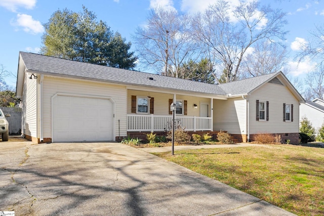 single story home featuring covered porch, a garage, and a front lawn