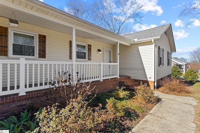 property entrance with a porch