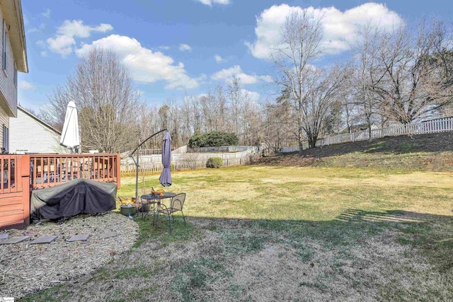 view of yard featuring a wooden deck