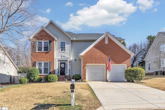 view of front of house featuring a front lawn, central AC unit, and a garage