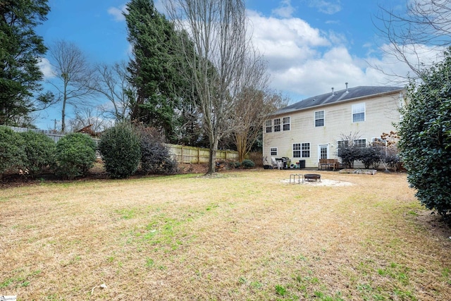 view of yard with an outdoor fire pit