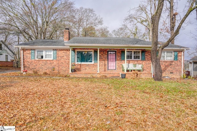 single story home with a front yard