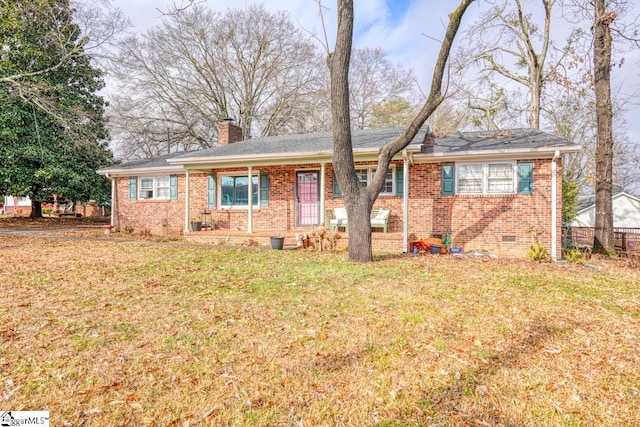 single story home with a front yard