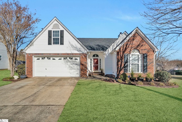 view of front of home featuring a front lawn and a garage