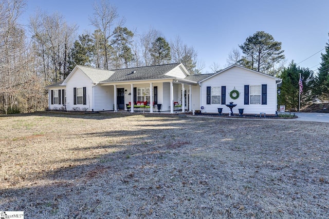 single story home featuring covered porch